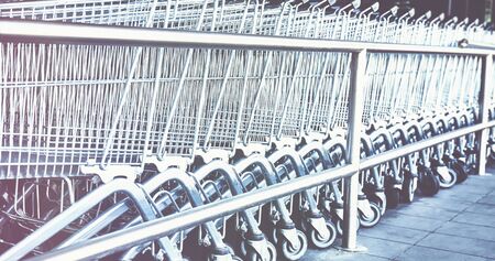 Row of empty shopping carts