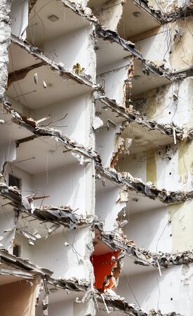 Demolished multi storey building without front wall.の写真素材