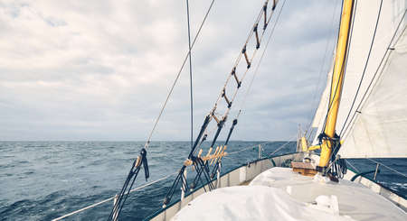 Panoramic view of an old schooner sailing the ocean.の写真素材