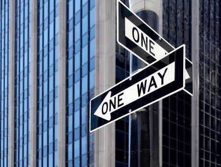 One way street traffic signs in New York City, selective focus, USA.
