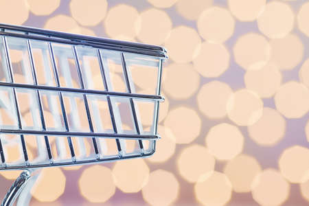 Close up picture of an empty shopping cart, color toned conceptual picture, selective focus.の写真素材