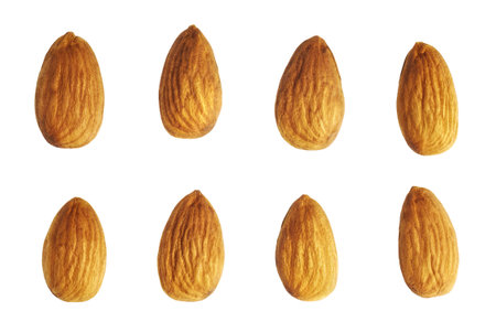 Close up picture of almonds isolated on white background.の写真素材