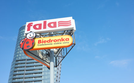 Szczecin, Poland - February 11, 2021: Biedronka ad at Fala shopping center against the blue sky.のeditorial素材