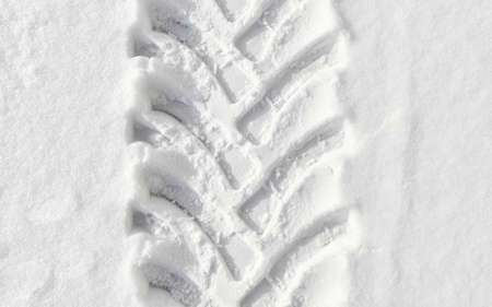 Picture of heavy duty vehicle tire track in snow, abstract background.の写真素材