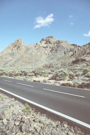 Scenic road in Teide National Park, color toning applied, Tenerife, Spain.
