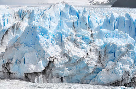 Ice calving from the terminus of the Perito Moreno Glacier in Patagonia, Argentina.