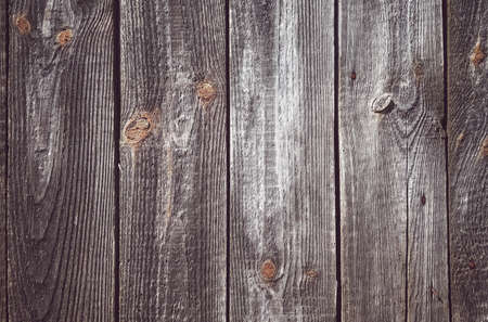 Picture of an old rough wooden board wall.の写真素材