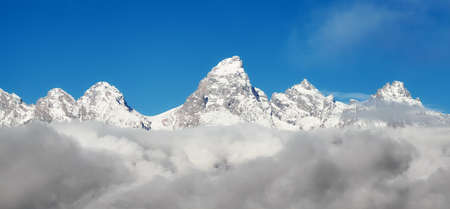 Panoramic view of Teton range in clouds, Wyoming, USA.の写真素材