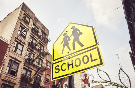 School crossing sign in New York City, color toning applied, USA.の写真素材