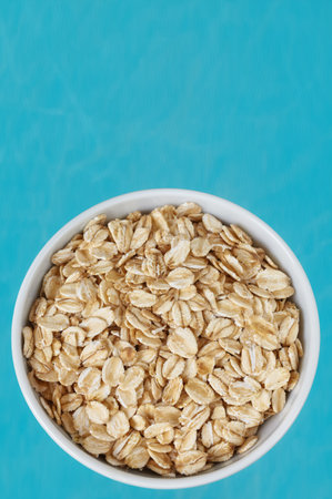 Picture of organic oat flakes in a bowl, selective focus.の写真素材