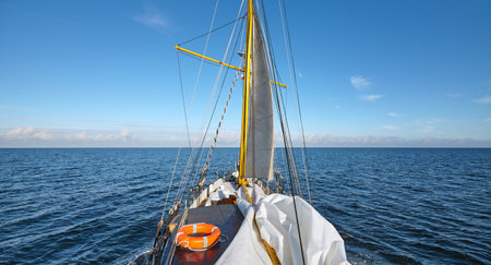 Sailing old schooner on a beautiful sunny day.の写真素材