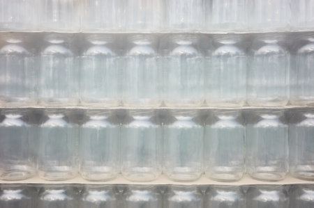Picture of packed and foiled new empty jars, selective focus.の写真素材