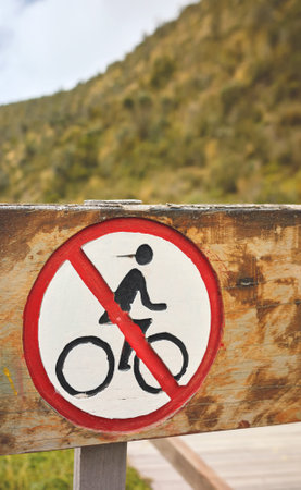 Close up photo of old wooden no bicycles sign, selective focus.の写真素材
