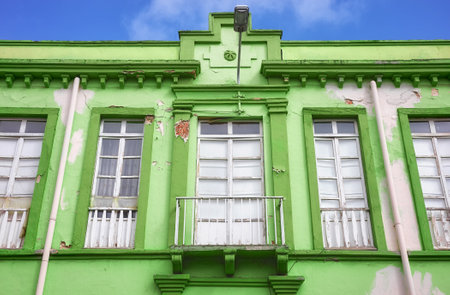 Street view of an old colonial building facade, Cuenca, Ecuador.の写真素材