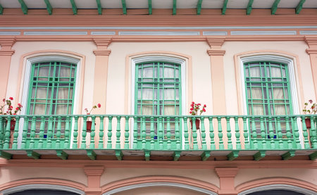 Street view of an old colonial building facade, Cuenca, Ecuador.の写真素材