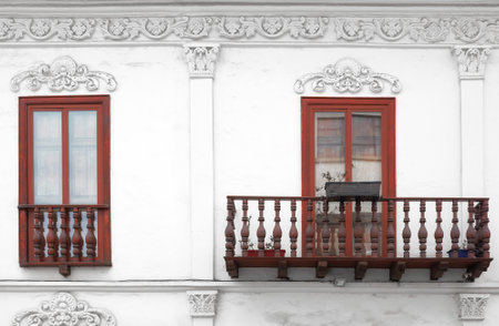 Street view of the old facade of a colonial building, Cuenca, Ecuador.の写真素材
