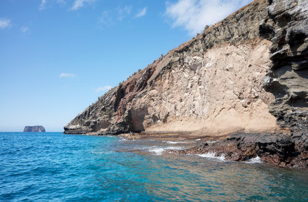 Galapagos Island cliff seen from the water, Ecuador.の写真素材