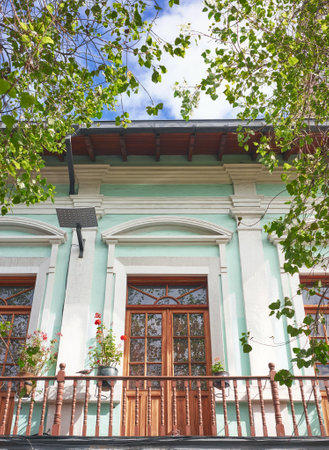 Street view of an old colonial building facade in Quito, Ecuador.の写真素材