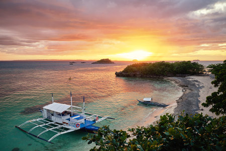 Beautiful sunset on Malapascua Island, Philippines.の写真素材