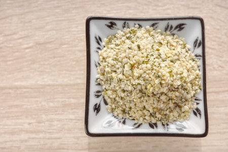 Close up photo of hulled hemp seeds, selective focus.の写真素材