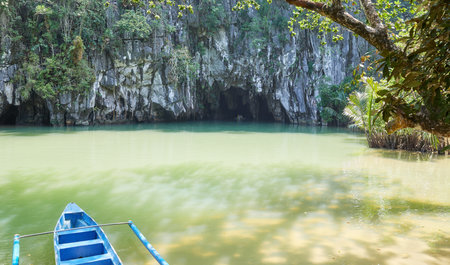 Boat at the entrance to the underwater river at the Puerto Princesa Subterranean River National Park, Palawan, Philippines.の写真素材