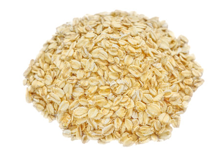 Oatmeal isolated on a white background, selective focus.の写真素材
