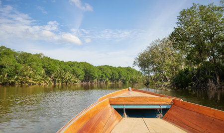 The bow of a boat sailing on the Brunei River (Sungai Brunei), Brunei.の写真素材