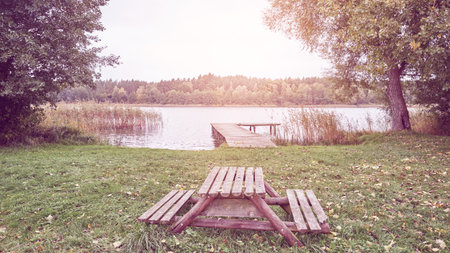 Picnic spot by the lake, color toning applied.の写真素材