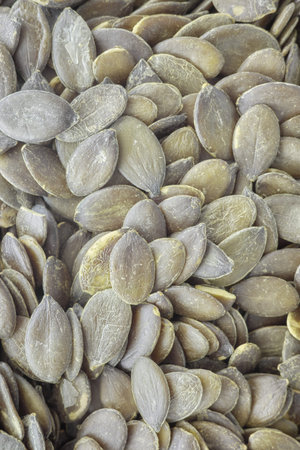 Close up of shelled pumpkin seeds.の写真素材