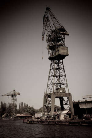 Wery high old crane in shipyardの写真素材