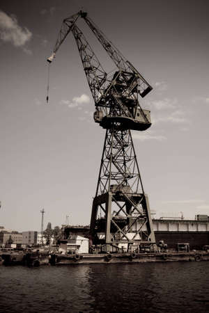 Wery high old crane in shipyard