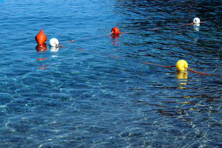 Buoys floating on the seaの写真素材