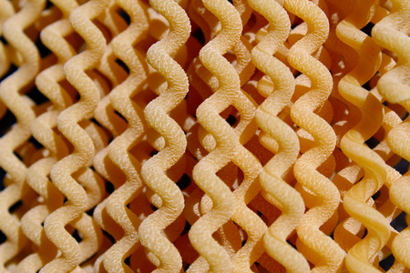 Uncooked long fusilli pastaの写真素材