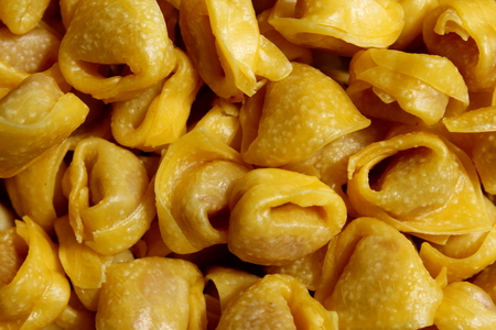 Uncooked tortellini pastaの写真素材
