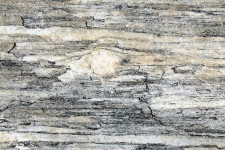 Porphyroclast surrounded by foliation in metamorphic rockの写真素材
