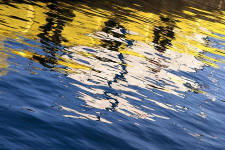 Reflection of boat on water