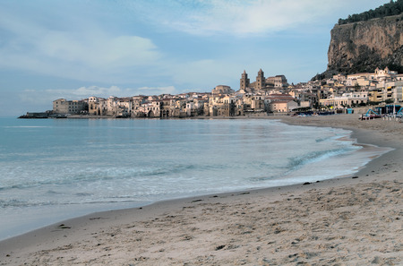 view of the historic town of Cefalu in Sicily from the beachの写真素材