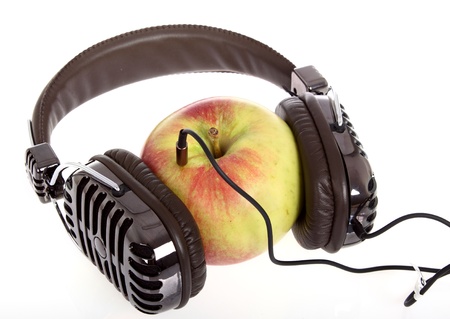 Red apple with headphones  Music concept  の写真素材