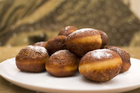 traditional homemade polish donuts on the plateの写真素材