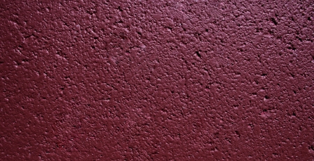 Dark maroon cinder block wall texture colorfulの写真素材