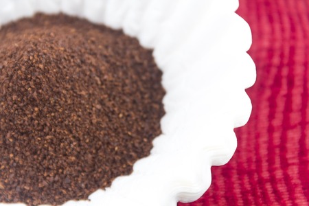 Fresh coffee grounds ready to be brewed for morning jolt of caffeineの写真素材