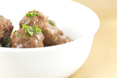 Delicious Swedish meatballs with a hearty brown sauceの写真素材