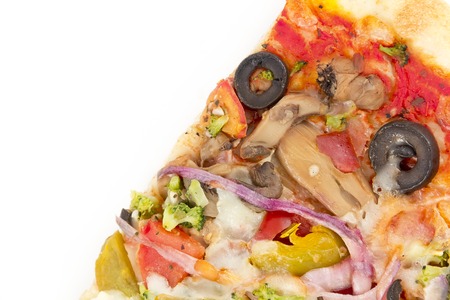 Vegetarian slice of pizza with black olives isolated on whiteの写真素材