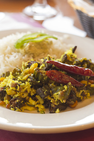 Indian vegetarian fried okra with basmati riceの写真素材