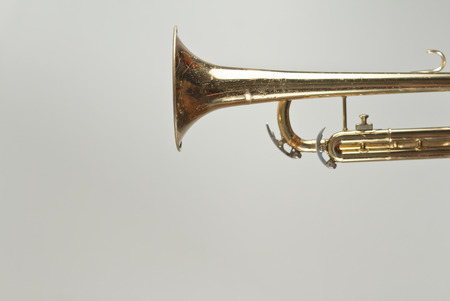 Musical instrument old rusty trumpet background side viewの写真素材