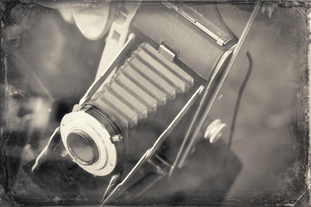 Antique accordion lens autographic fold-out camera from late 1910's to 1920's in photograph style inspired by this cameras eraの写真素材