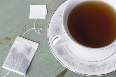 British black tea in a dainty tea cup and saucerの写真素材