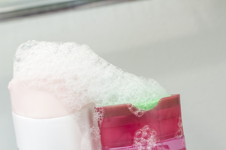Liquid soap or shampoo dispenser with fun lathered soap suds