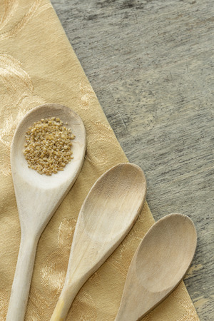 Healthy and organic bulgur wheat ready for cooking in this nutrition aware cooking backgroundの写真素材