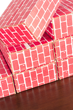 Cardboard brick column graph showing steady growthの写真素材